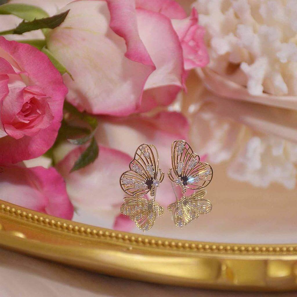 Set oorbellen met vlindermotief