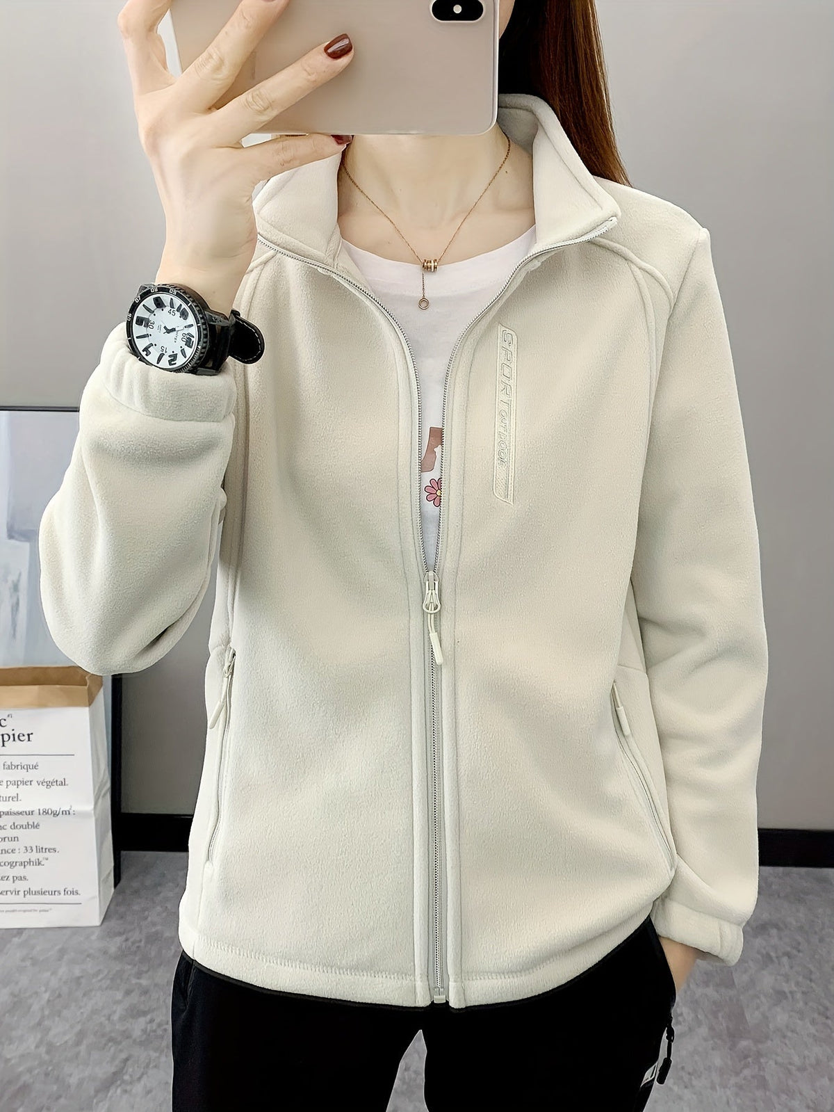 Ademende fleece jas