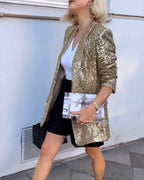 Gouden glitterjack met pailletten