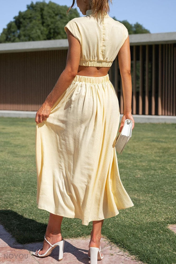 Midi zomerjurk met col en taille uitsparing