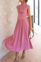 Midi zomerjurk met col en taille uitsparing