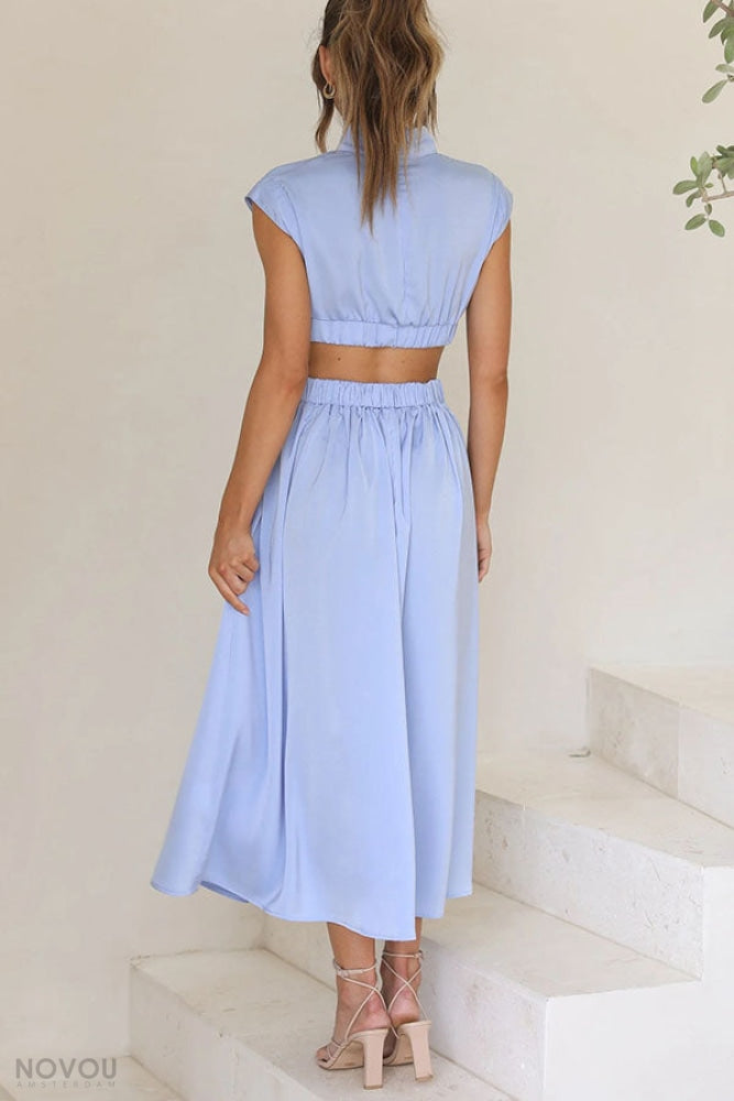 Midi zomerjurk met col en taille uitsparing