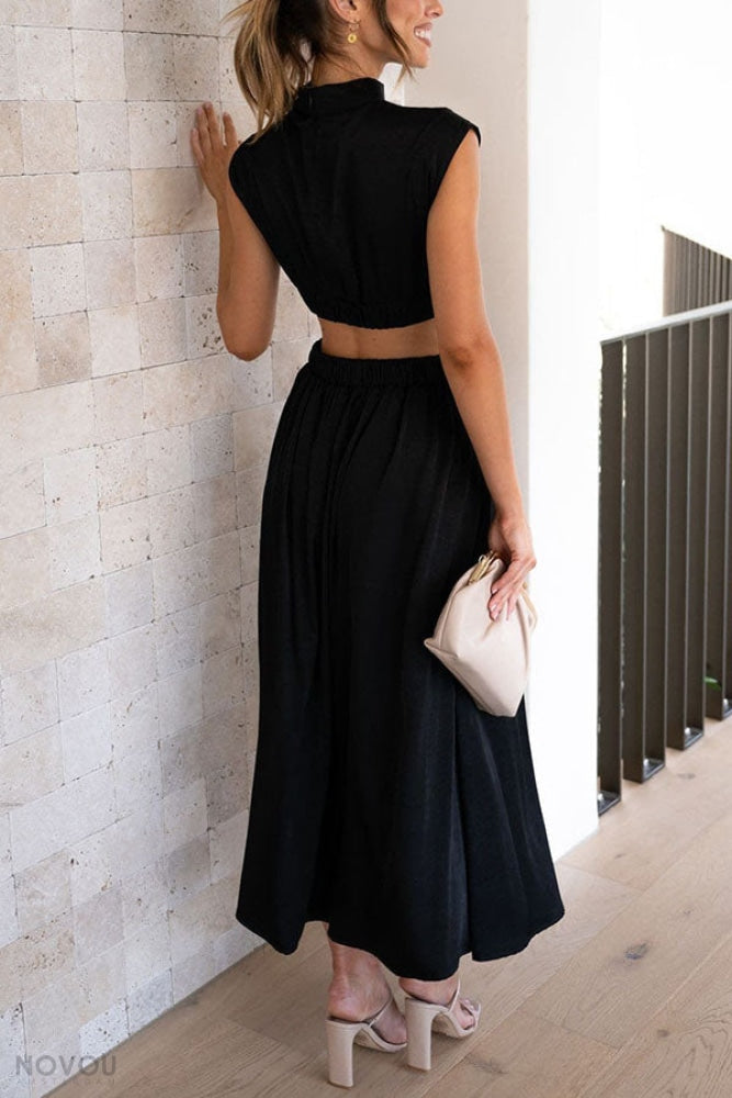 Midi zomerjurk met col en taille uitsparing