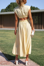 Midi zomerjurk met col en taille uitsparing