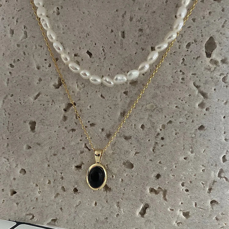 Zwarte onyx en parel stapelketting