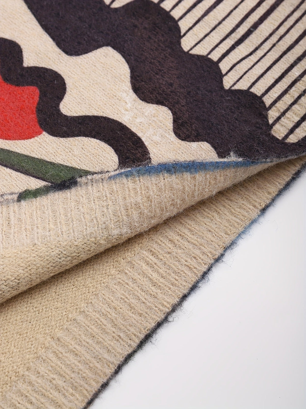 Ruime gebreide trui met abstracte lijnprint