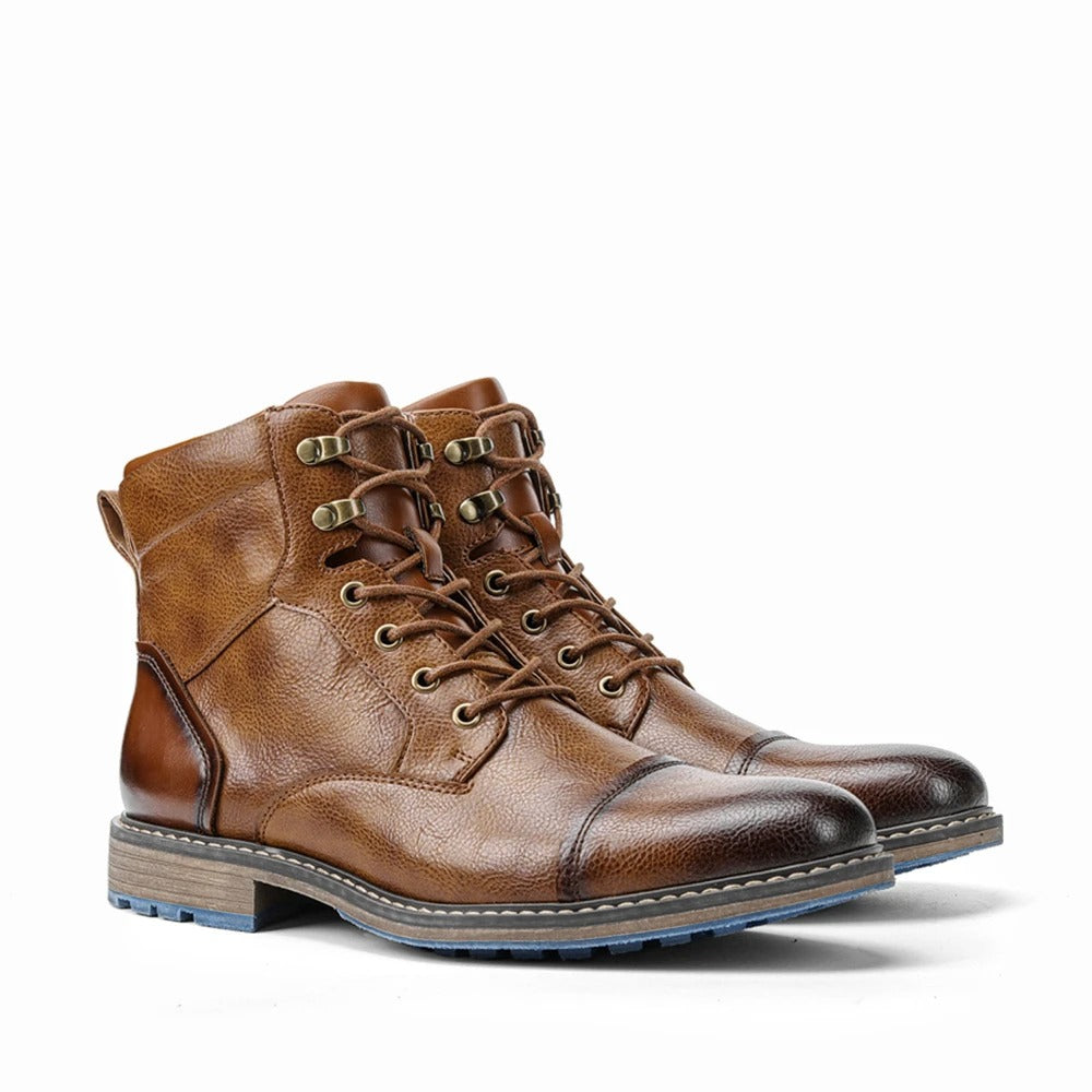Herenenkelboots van rundleer met neuskap en zijrits