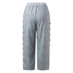 Gestreepte hoge taille damesbroek met decoratieve knopen