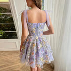 Tulle cocktailjurk met bloemenapplicaties