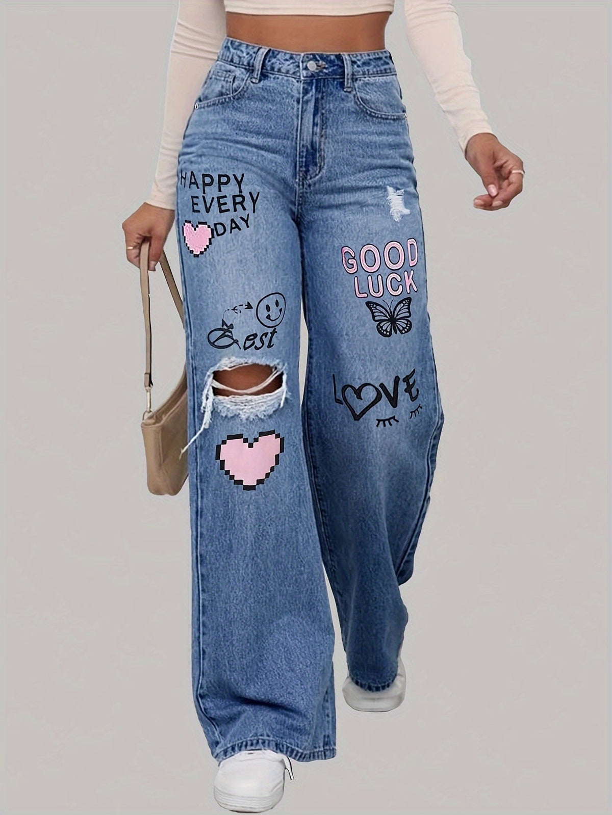 Dames jeans met hartjes- en graffitiprint