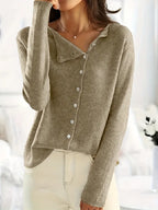 Effen asymmetrisch vest met knoopsluiting