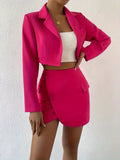 Roze outfit met knopen