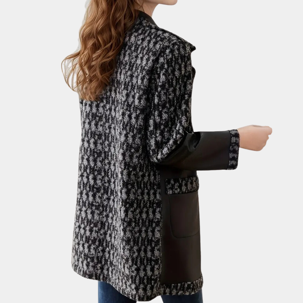Warme zwarte damesjas met afwerking