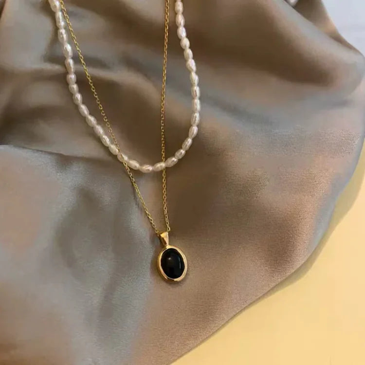 Zwarte onyx en parel stapelketting