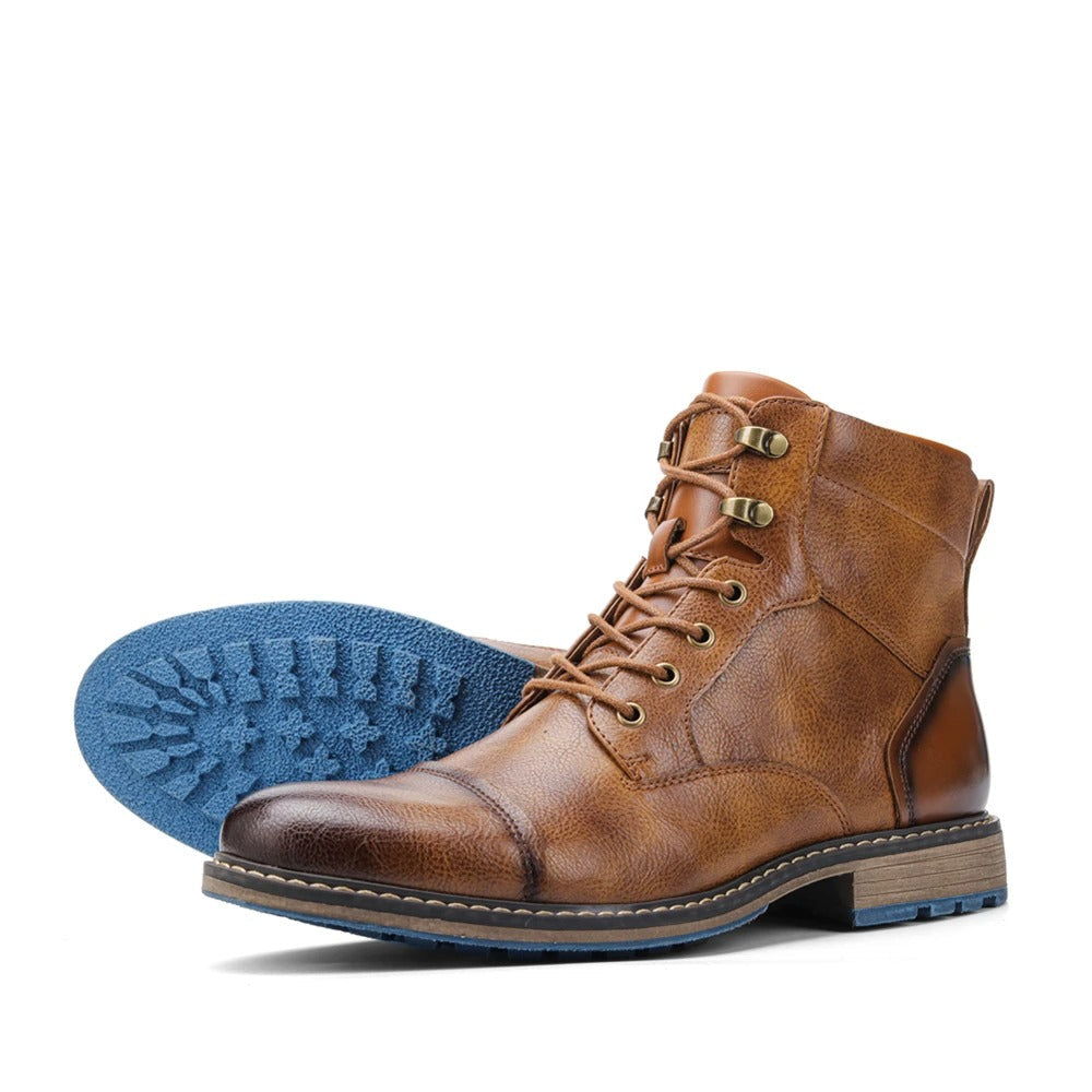 Herenenkelboots van rundleer met neuskap en zijrits