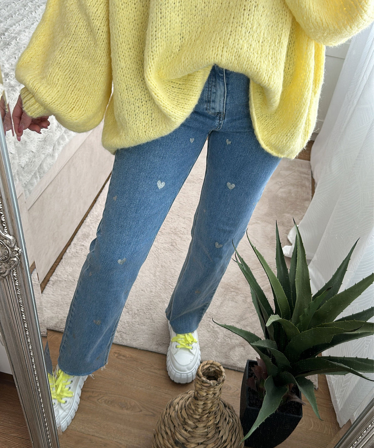 Dames stretch jeans met wijde pijpen en hartjesprint