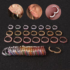 Kleurrijke oor piercings ringen