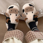 Damesslippers met koeienmotief