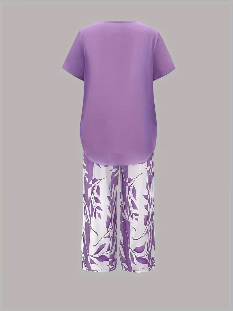 Tweedelige set met gelaagde top en bladprintbroek