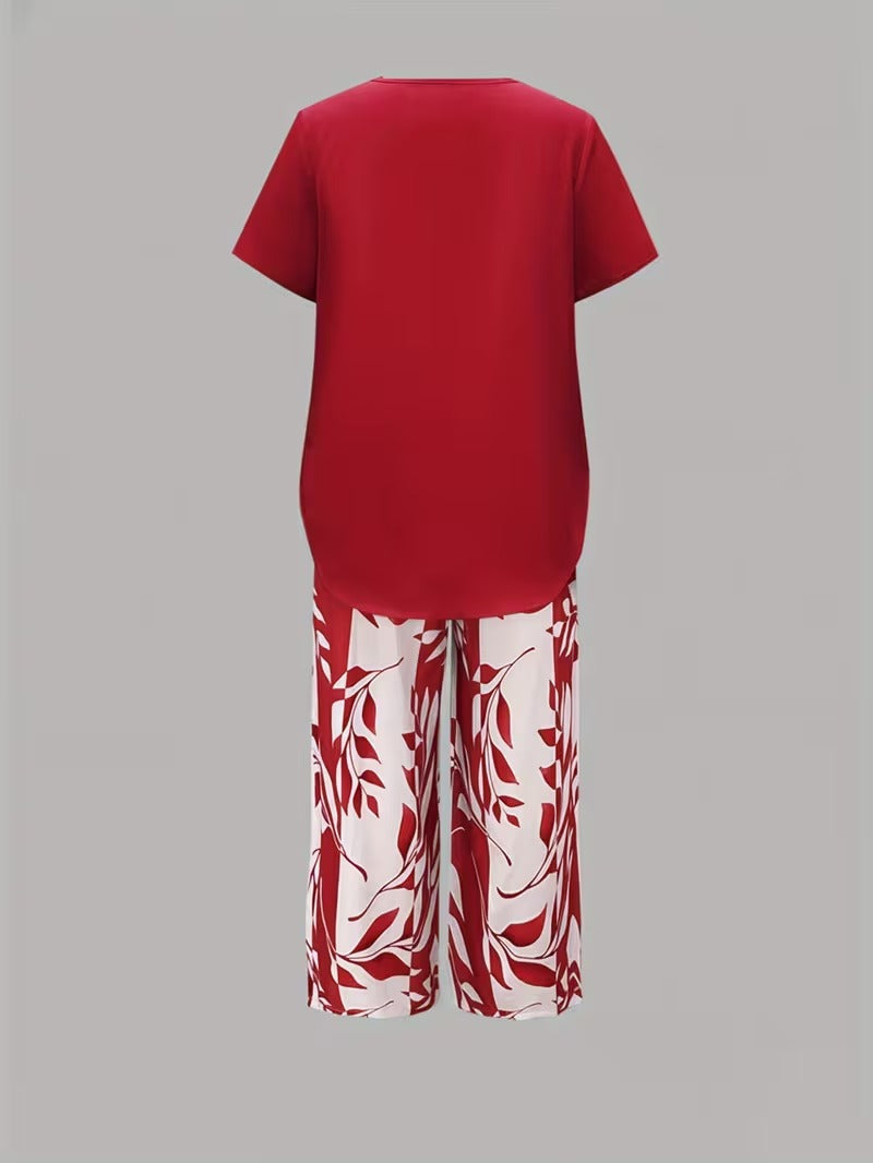 Tweedelige set met gelaagde top en bladprintbroek