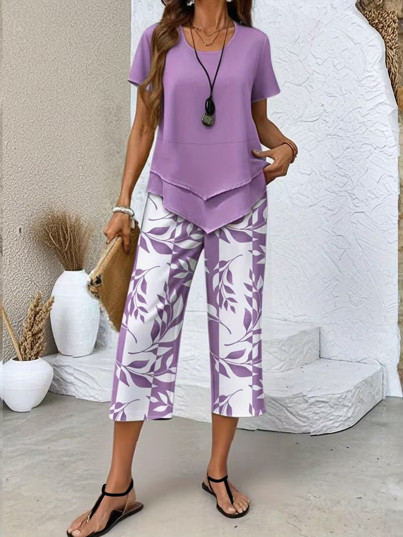Tweedelige set met gelaagde top en bladprintbroek