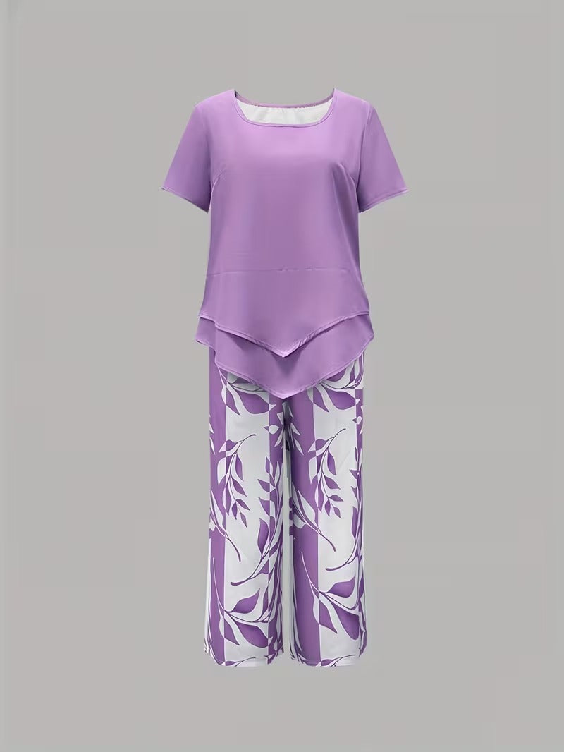 Tweedelige set met gelaagde top en bladprintbroek