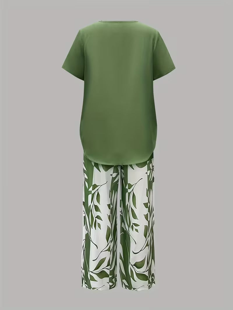 Tweedelige set met gelaagde top en bladprintbroek