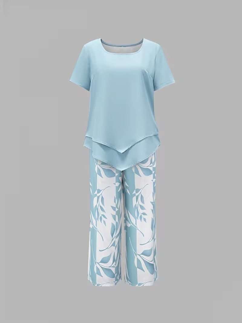 Tweedelige set met gelaagde top en bladprintbroek
