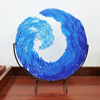Glazen sculptuur van oceaangolf
