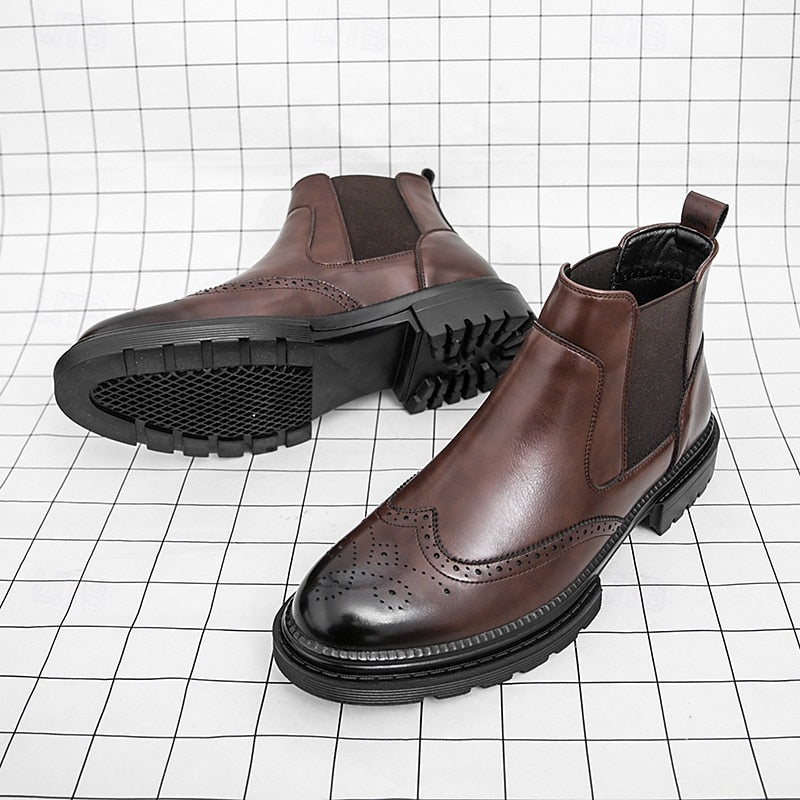 Chelsea boots met wingtip- en broguedetails