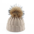 Gebreide winter pom-pom muts