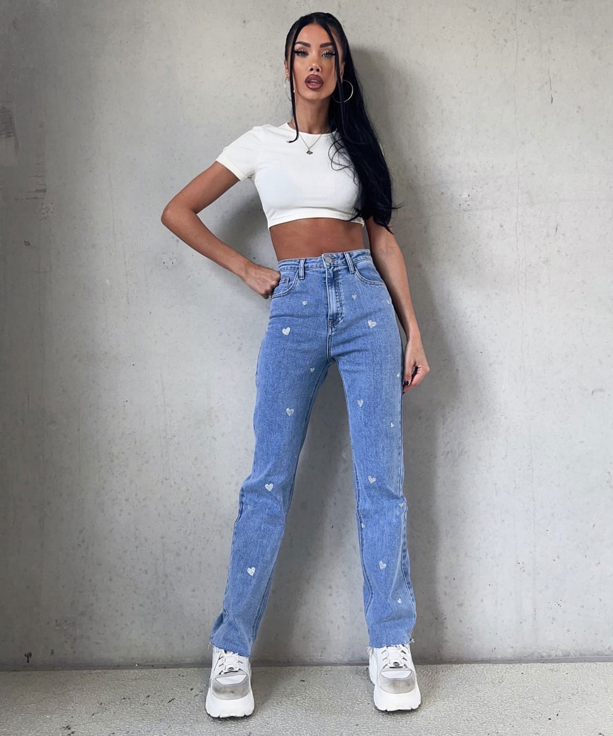Dames stretch jeans met wijde pijpen en hartjesprint