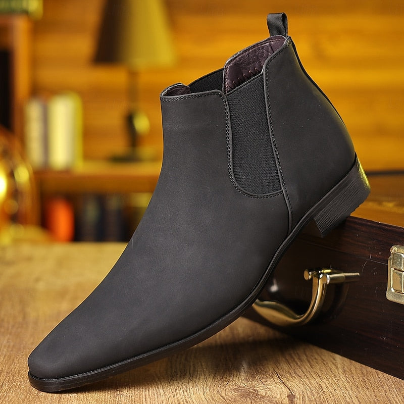 Chelsea boots met elastische zijpanelen en lage hak