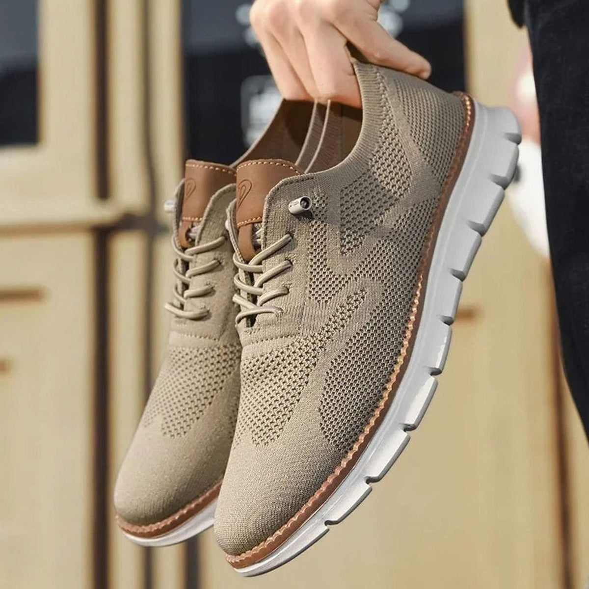 Gebreide herensneakers met leren hieltab