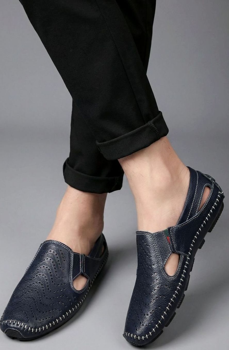 Geperforeerde herenloafers met handgestikte naden en flexibele zool