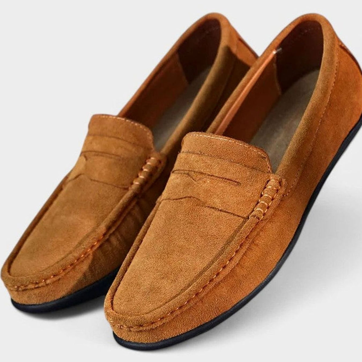 Suède herenpennyloafers met leren voering