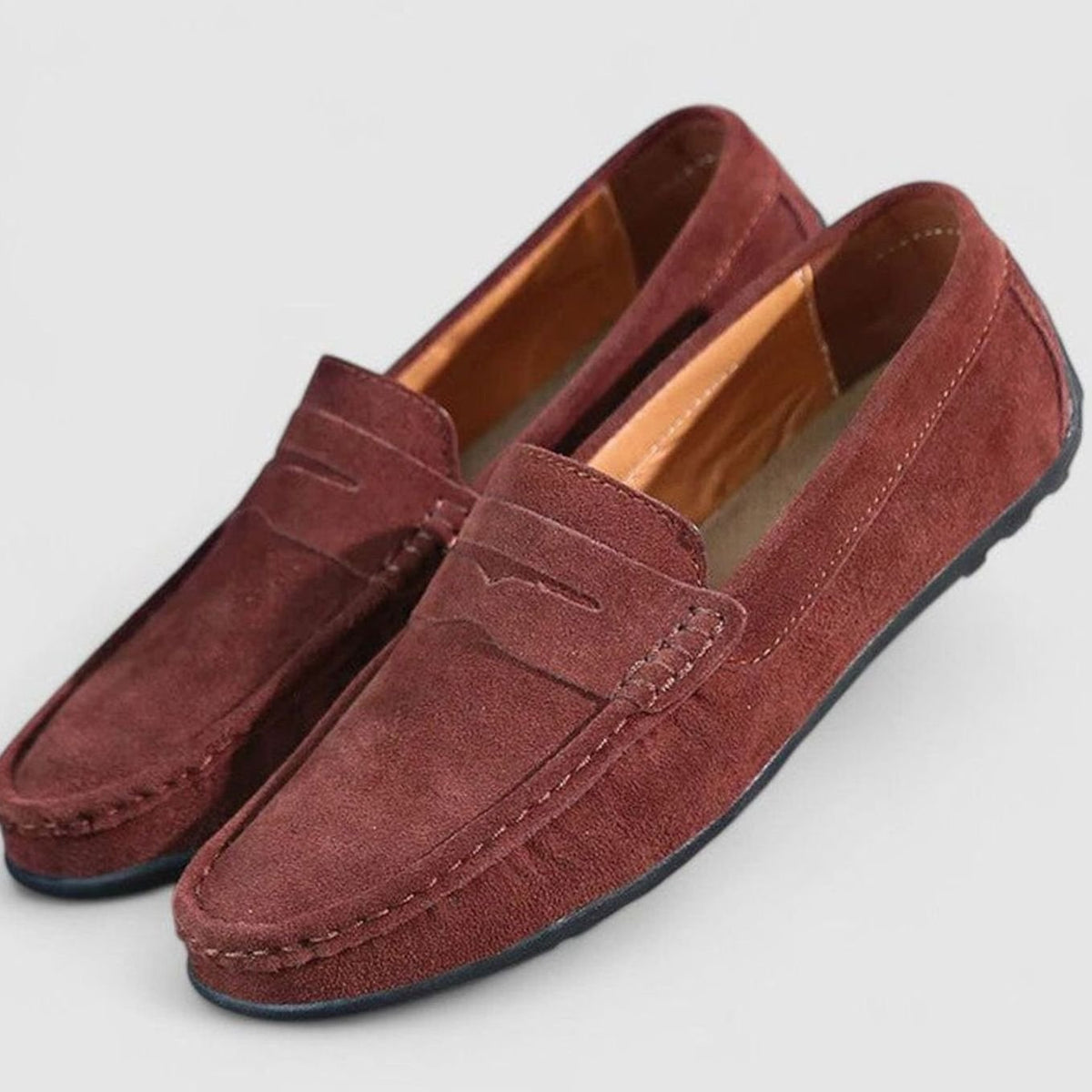 Suède herenpennyloafers met leren voering