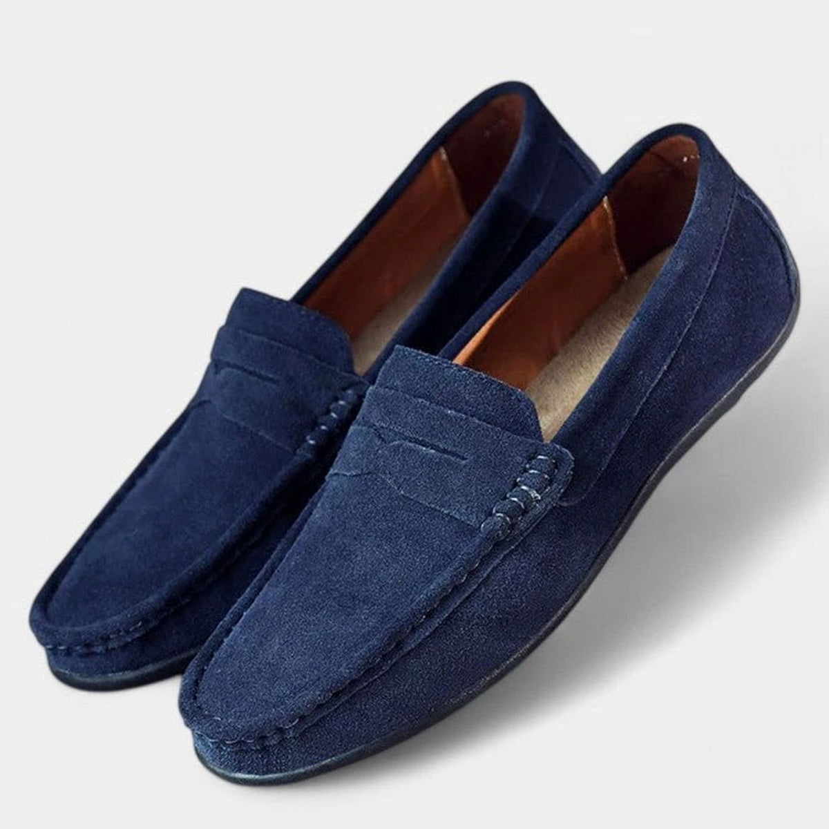 Suède herenpennyloafers met leren voering