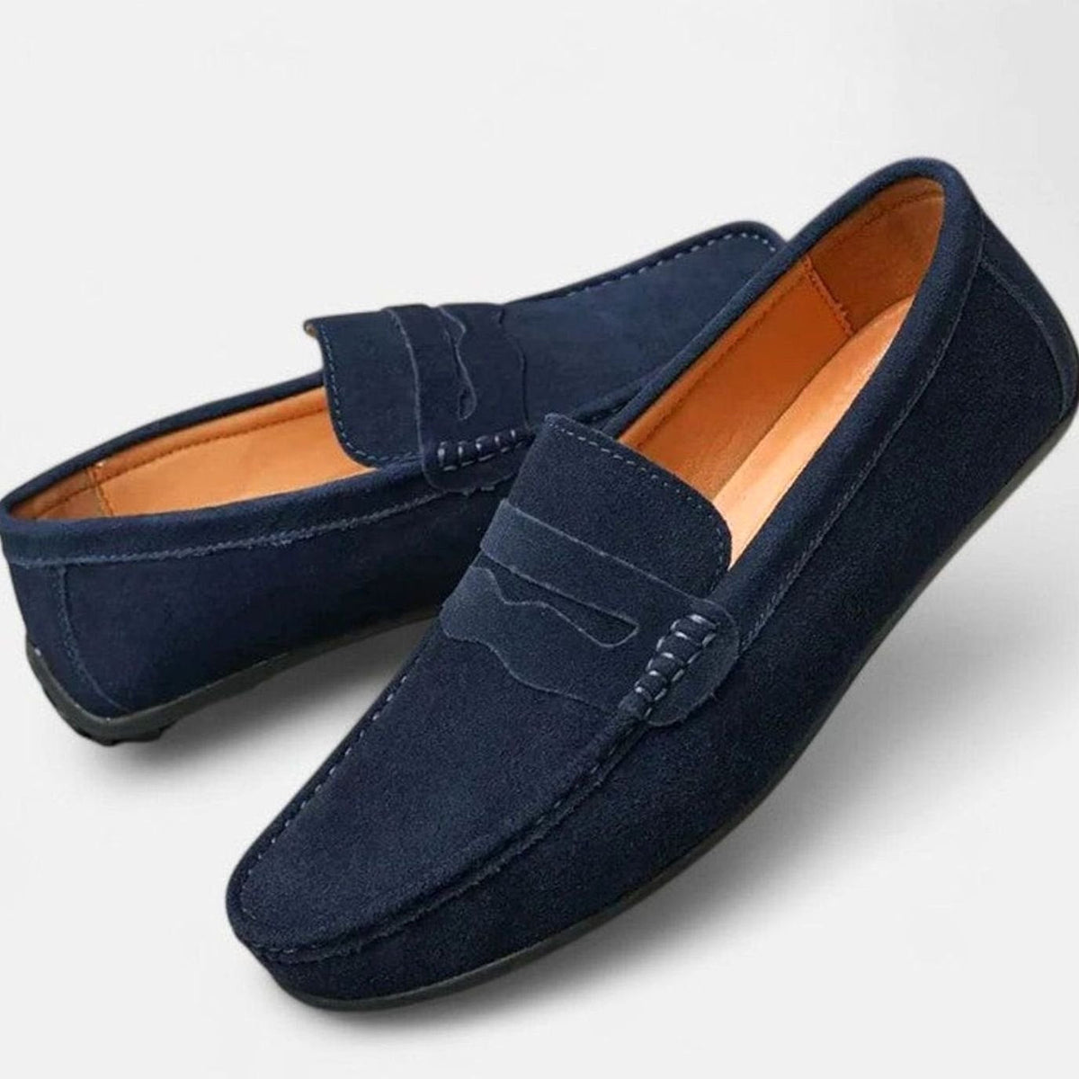 Suède herenpennyloafers met leren voering