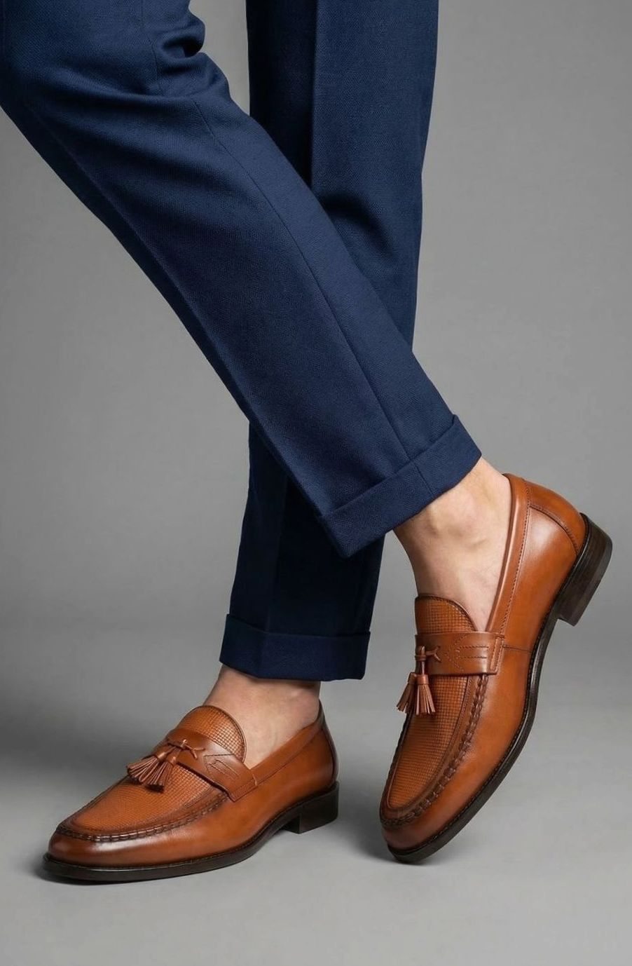 Leren herenloafers met geweven neus en kwastjes