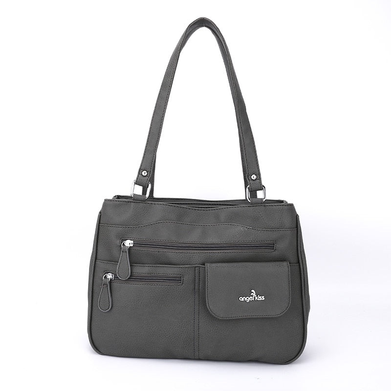 Multi-vakken dames schouder- en crossbody handtas
