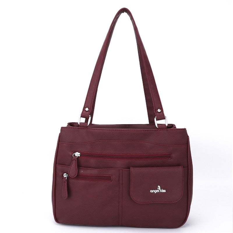 Multi-vakken dames schouder- en crossbody handtas