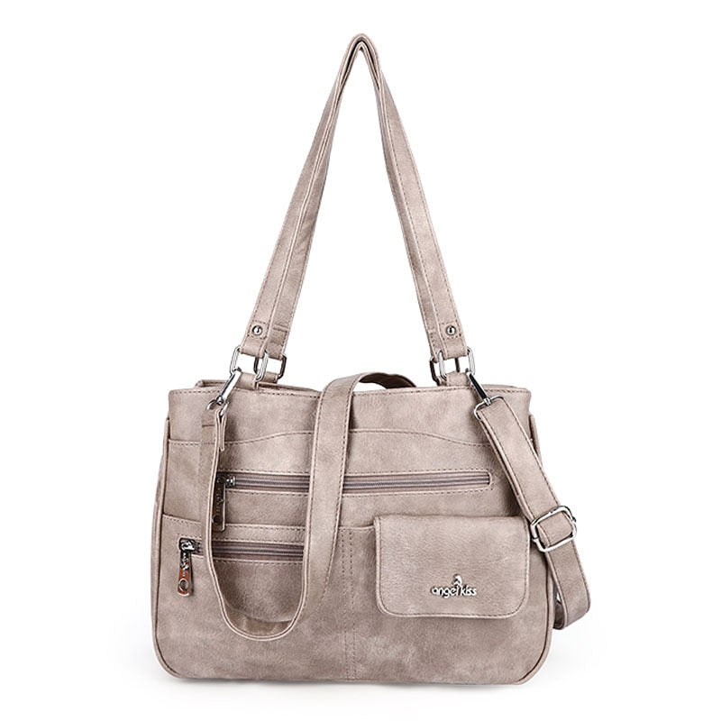 Multi-vakken dames schouder- en crossbody handtas