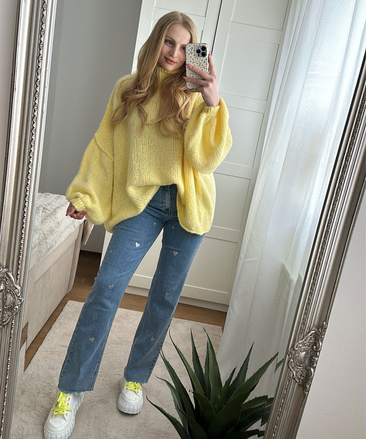 Dames stretch jeans met wijde pijpen en hartjesprint