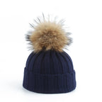 Gebreide winter pom-pom muts
