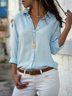 Losse damesblouse met knoopsluiting