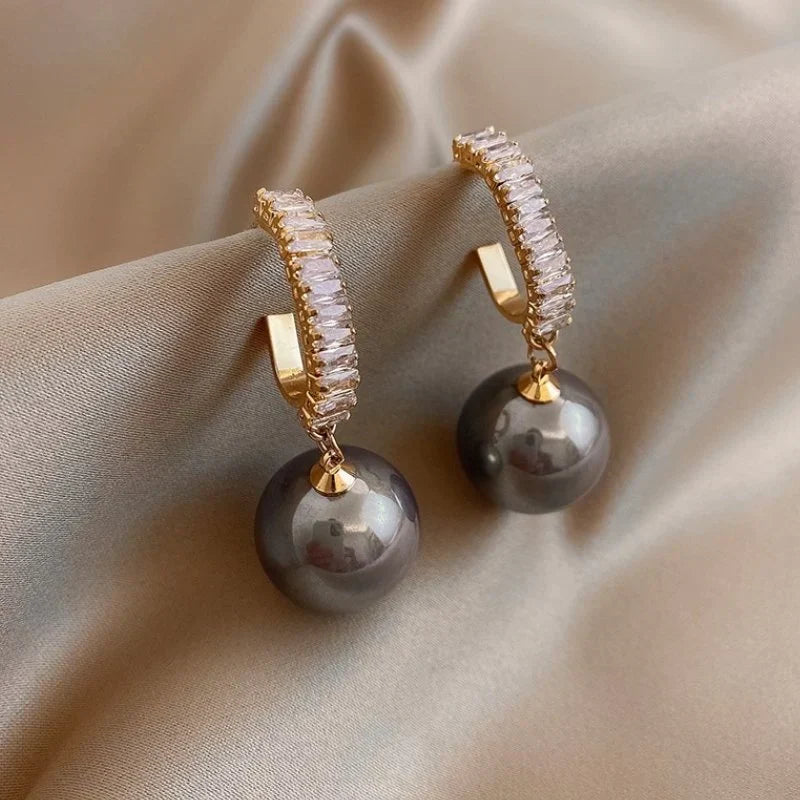 Luxueuze oorbellen met parels en zirkonia