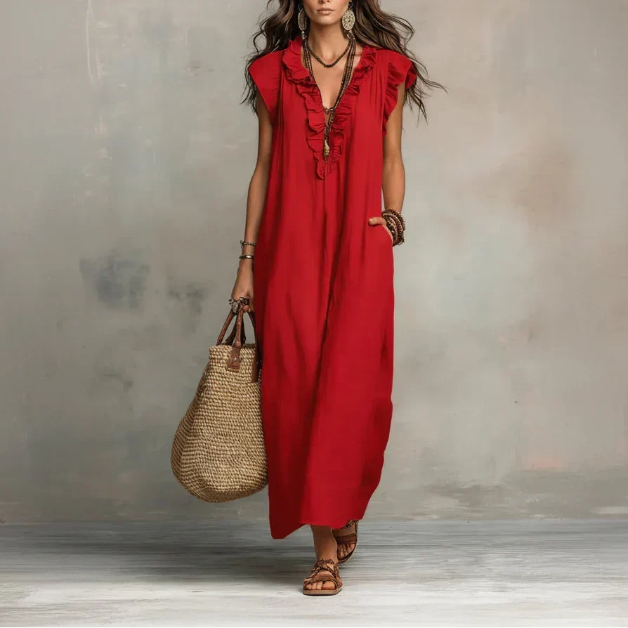 Merel | Lange bohemian jurk met volantdetails en functionele zakken
