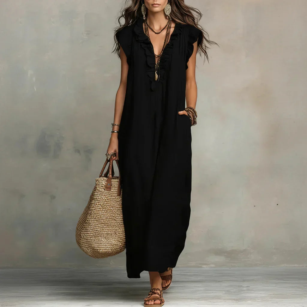 Merel | Lange bohemian jurk met volantdetails en functionele zakken