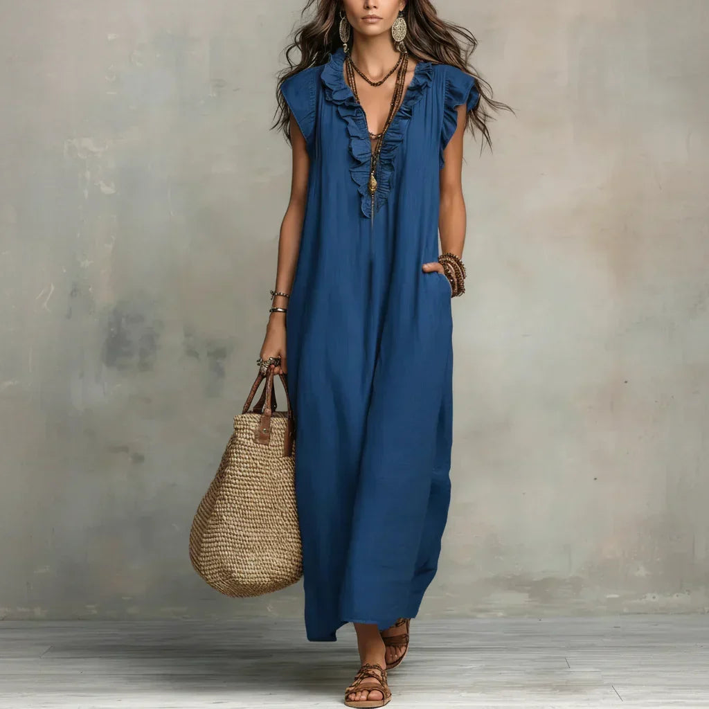 Merel | Lange bohemian jurk met volantdetails en functionele zakken